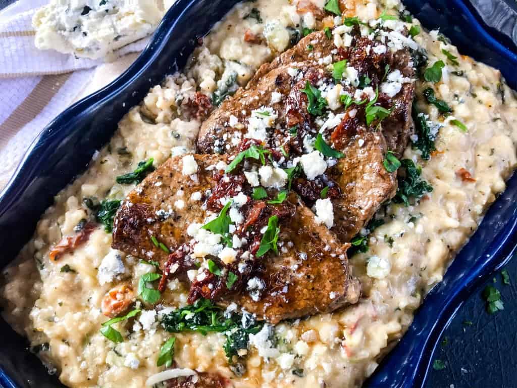 Steak on top of Italian risotto