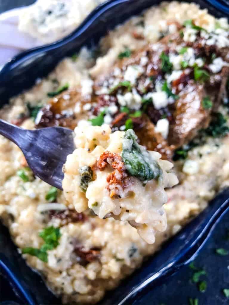 A fork of creamy Steak Gorgonzola Alfredo Risotto