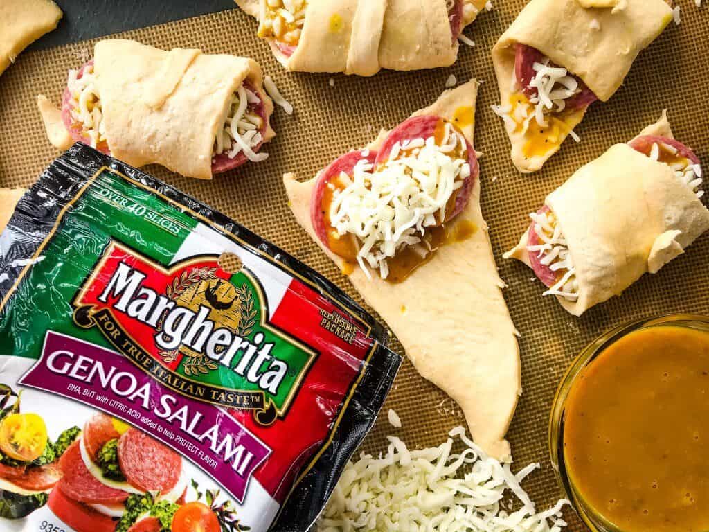 Cheesy Mustard Salami Crescent Rolls are filled with Margherita® Genoa Salami, cheese, and a simple mustard sauce served with more mustard sauce for dipping! An easy and fast appetizer recipe for party entertaining and game day or snack. #crescentrolls #salami #appetizerrecipes