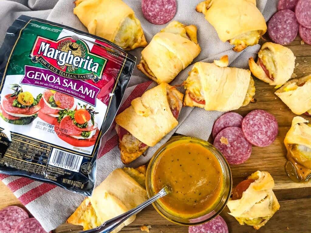 Cheesy Mustard Salami Crescent Rolls are filled with Margherita® Genoa Salami, cheese, and a simple mustard sauce served with more mustard sauce for dipping! An easy and fast appetizer recipe for party entertaining and game day or snack. #crescentrolls #salami #appetizerrecipes