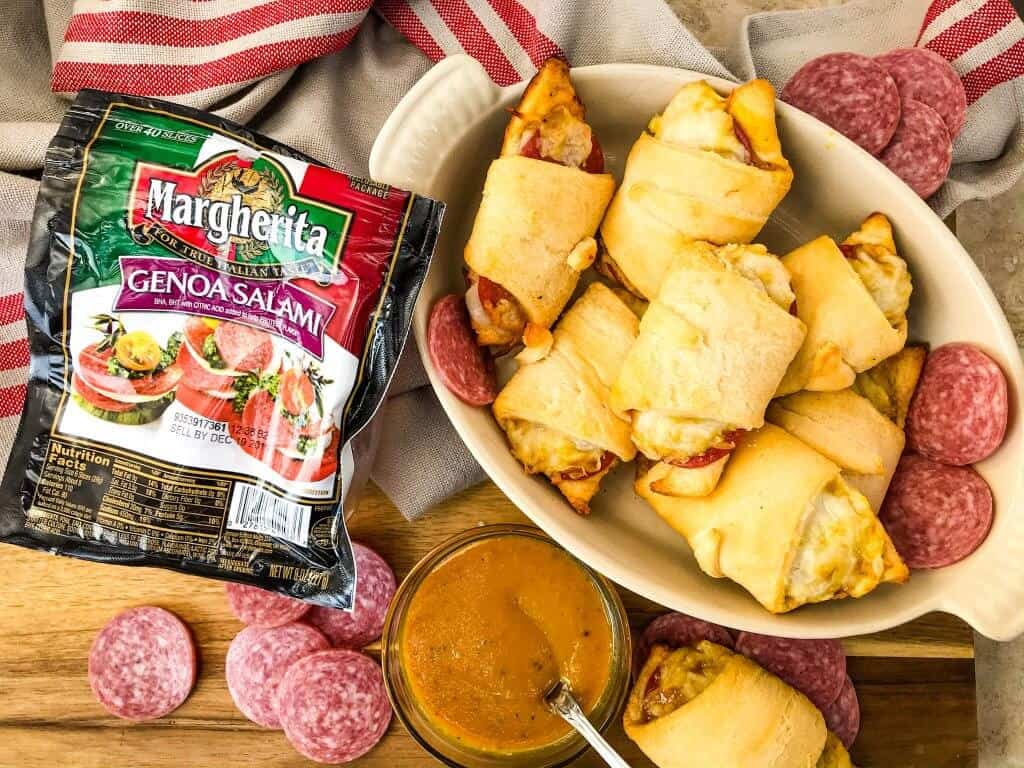 Cheesy Mustard Salami Crescent Rolls are filled with Margherita® Genoa Salami, cheese, and a simple mustard sauce served with more mustard sauce for dipping! An easy and fast appetizer recipe for party entertaining and game day or snack. #crescentrolls #salami #appetizerrecipes