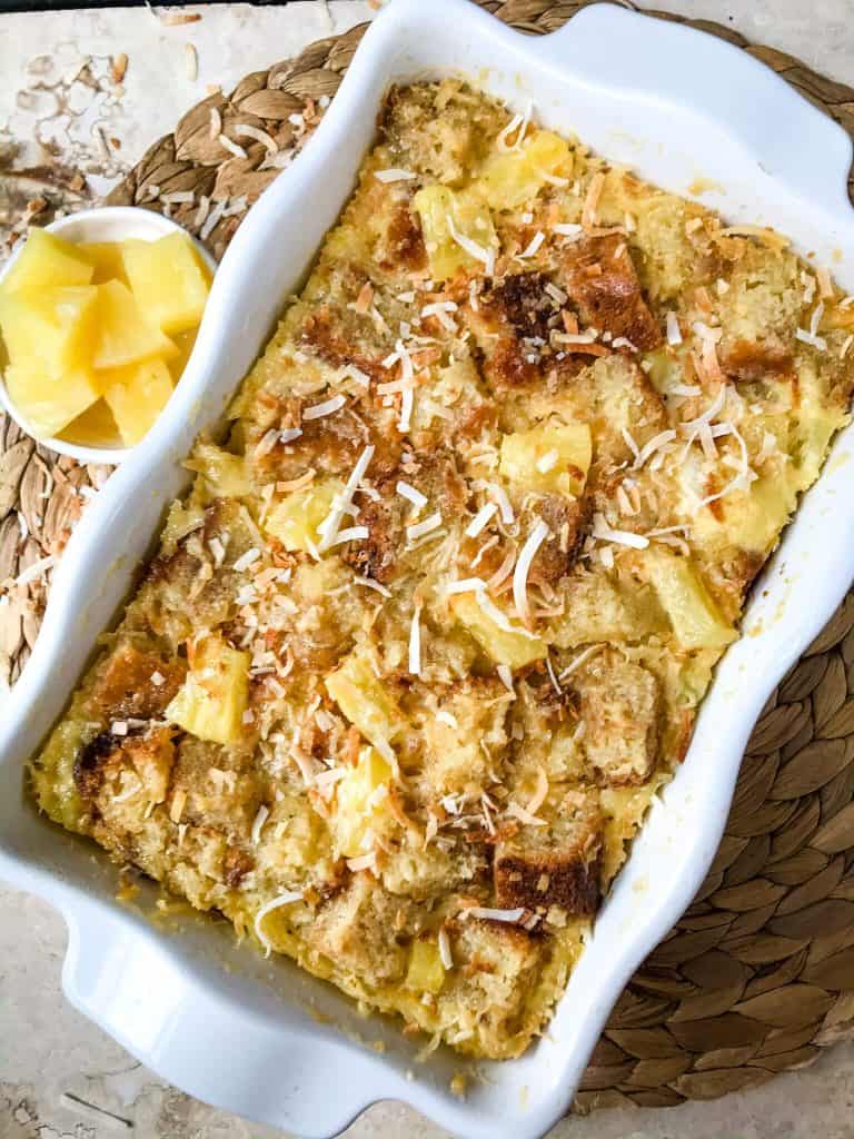 Pina Colada Bread Pudding is full of pineapple, coconut, and rum in a simple dessert recipe. A sweet take on the rum cocktail. #pineapplecoconut #pinacolada #breadpudding