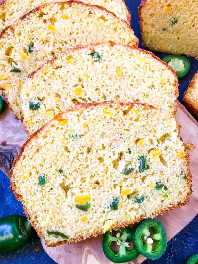 Jalapeno Cornbread is a quick bread recipe filled with peppers, corn, and cheese. Great side dish for BBQ or southern food. #jalapenopopper #cornbread