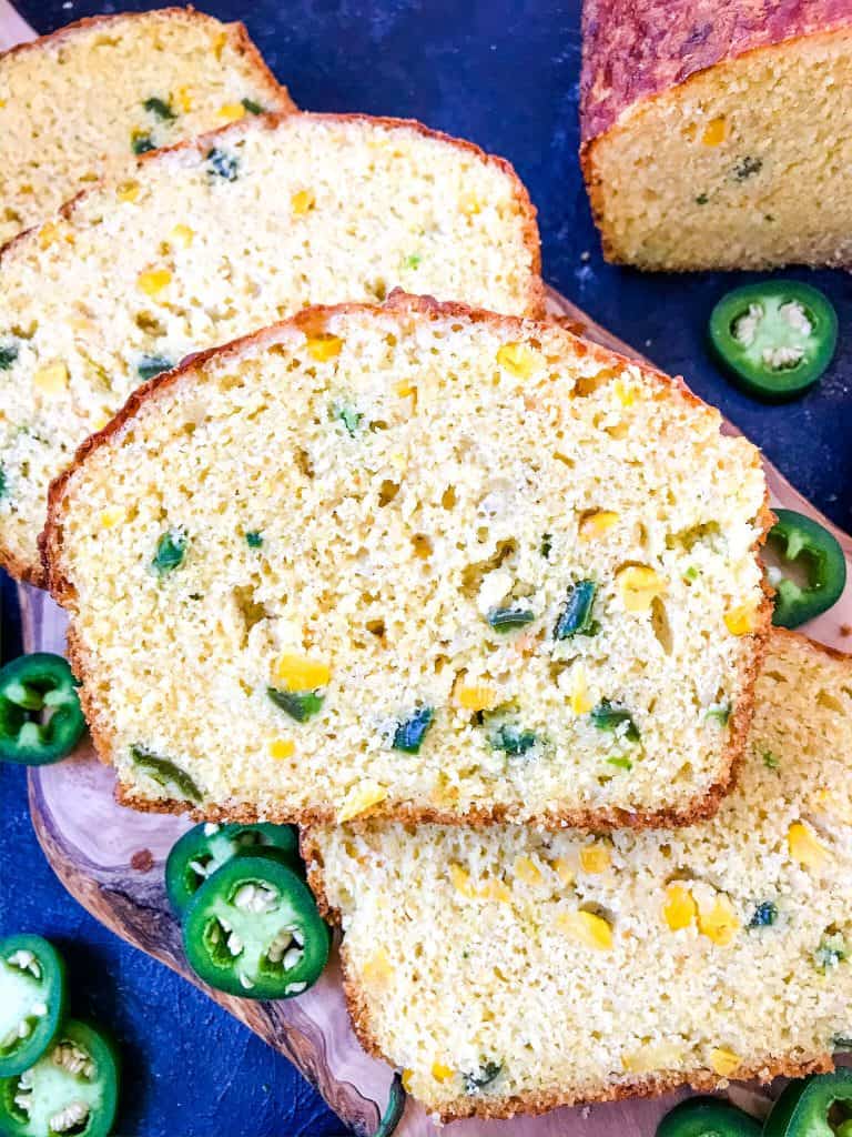 Jalapeno Cornbread is a quick bread recipe filled with peppers, corn, and cheese. Great side dish for BBQ or southern food. #jalapenopopper #cornbread