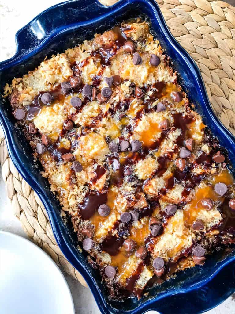 Samoa Bread Pudding is full of Samoa Girl Scout Cookie flavors of caramel, chocolate, and coconut in a simple dessert recipe. #girlscoutcookies #samoas #breadpudding