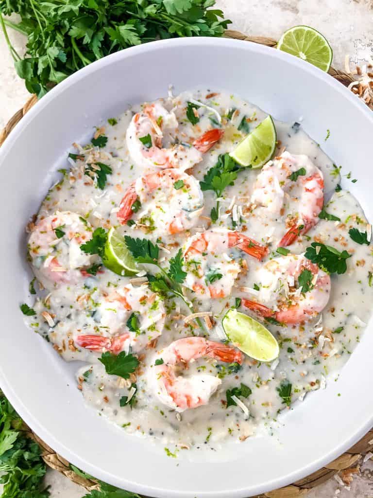 Coconut Lime Shrimp is ready in just 20 minutes! Gluten free and low carb Keto shrimp recipe cooked in a simple coconut milk and lime sauce. Serve with coconut rice. #coconutshrimp #coconutlime #shrimprecipe