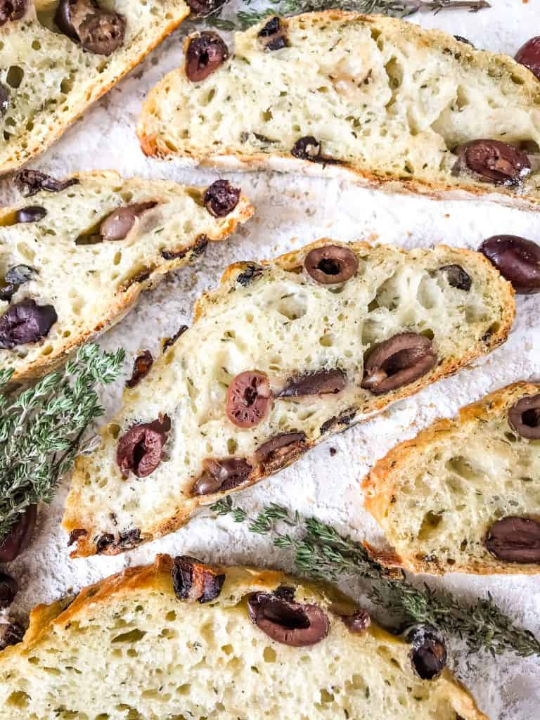 Slices of olive bread spread out