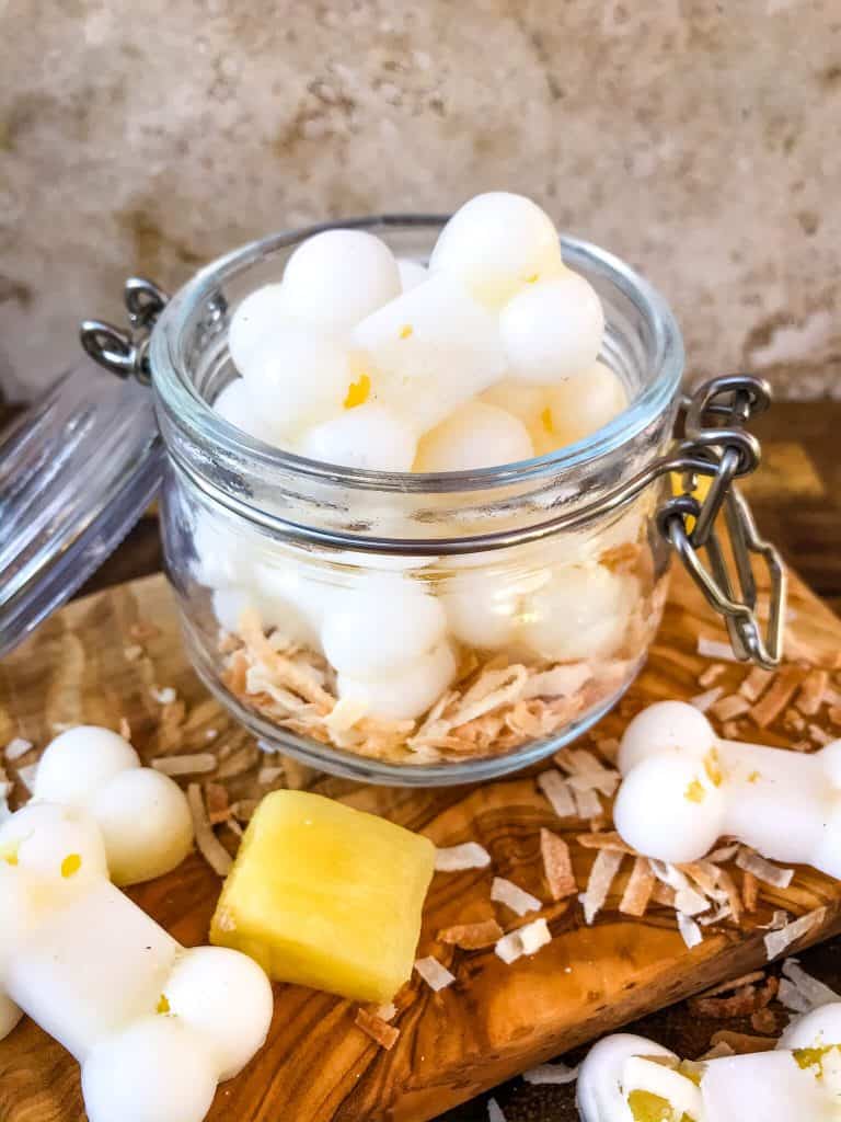 Frozen Pina Colada Dog Treats are a simple, healthy, easy DIY homemade dog treat recipe made with pineapple, coconut, and coconut oil which is great for their fur and skin. Check with your vet for any concerns. #homemadedogtreats #coconutoil #diydogtreats