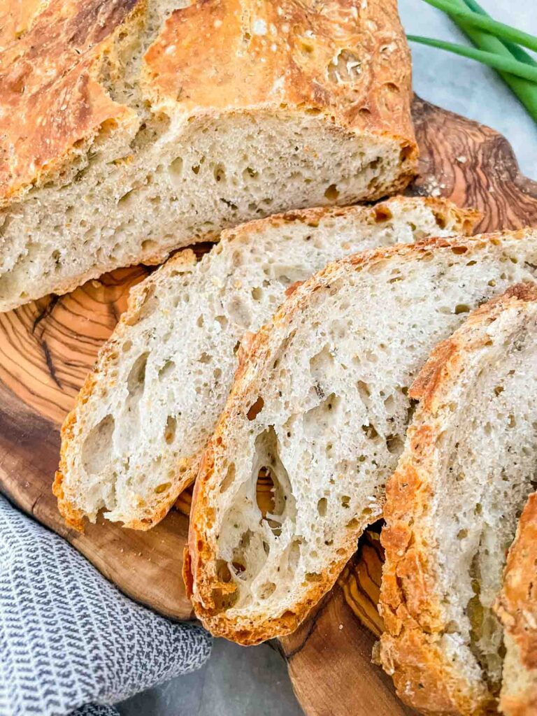 Sliced of No Knead Rustic Rosemary Bread up close