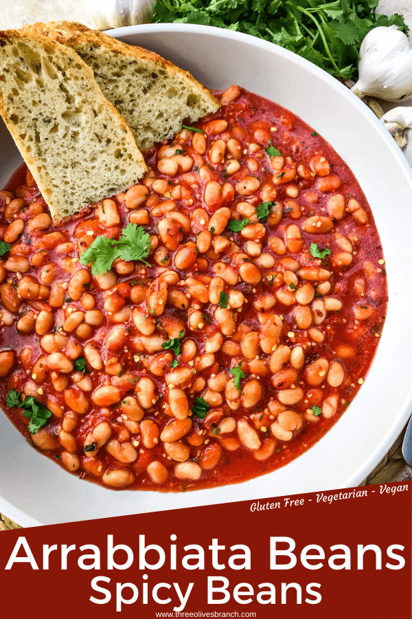 Arrabbiata Beans (Spicy Italian Beans) are based on the classic Italian pasta recipe. A spicy tomato sauce filled with garlic and crushed red pepper flakes with white beans. Vegan and gluten free pantry recipe. #beanrecipes #spicyItalian #Italianbeans