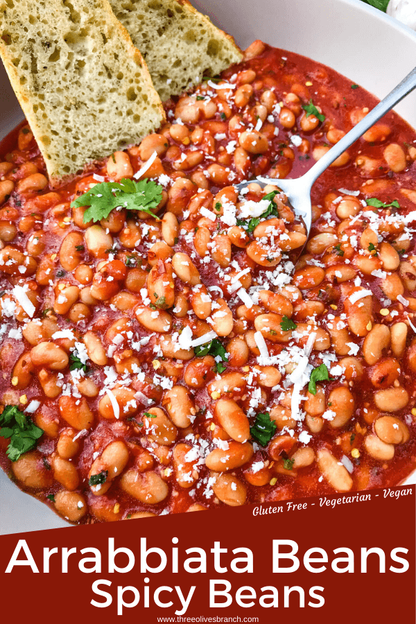 Arrabbiata Beans (Spicy Italian Beans) are based on the classic Italian pasta recipe. A spicy tomato sauce filled with garlic and crushed red pepper flakes with white beans. Vegan and gluten free pantry recipe. #beanrecipes #spicyItalian #Italianbeans