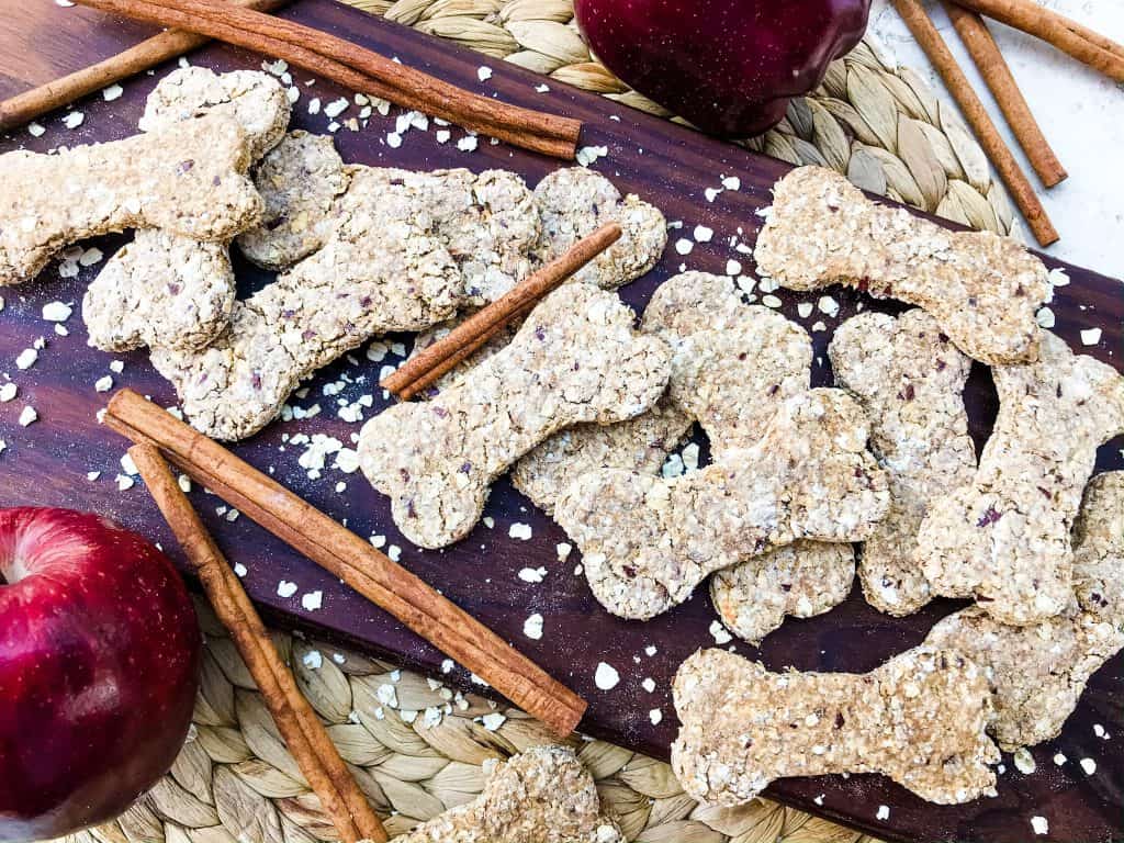 Oat Cinnamon Apple Dog Treats are full of simple ingredients in an easy homemade dog treat. These dog cookies are gluten free. Add flax seed if desired. #cinnamonapple #dogtreats #dogcookies