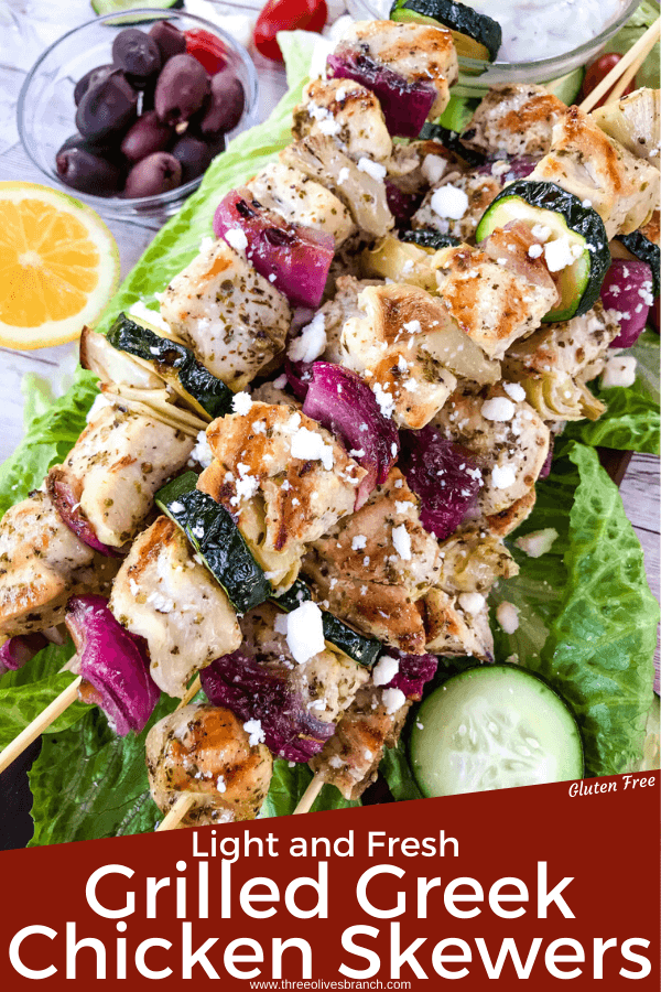 Fresh and Light Grilled Greek Chicken Skewers are a quick chicken grilling recipe for the BBQ! Chicken marinated in oil, oregano, and lemon on a kebab with onion, artichoke, and fresh Greek ingredients. Fast chicken kabob on the grill. #grilledchicken #chickenkabobs #greekchicken