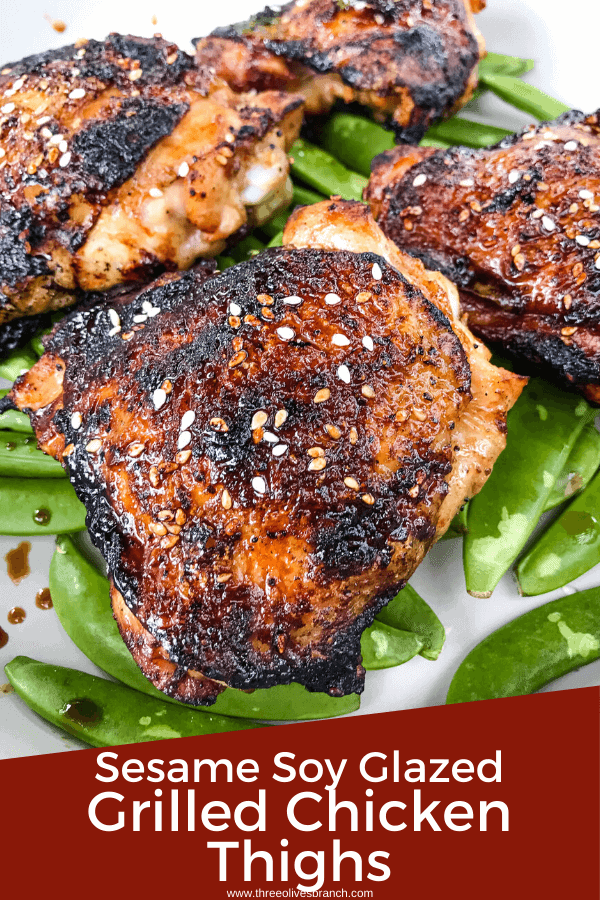 Sesame Soy Glazed Grilled Chicken Thighs are an easy grilled chicken recipe. BBQ bone in grilled chicken thighs are coated in a simple Asian glaze sauce. #grilledchickenthighs #glazedchickenrecipes #asianchickenrecipes