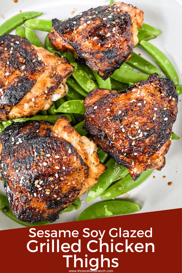 Sesame Soy Glazed Grilled Chicken Thighs are an easy grilled chicken recipe. BBQ bone in grilled chicken thighs are coated in a simple Asian glaze sauce. #grilledchickenthighs #glazedchickenrecipes #asianchickenrecipes