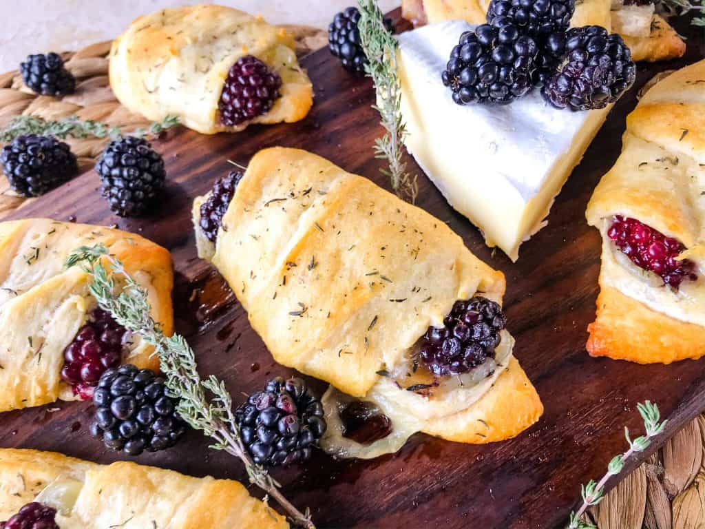 Blackberry Brie Crescent Rolls are a cheese crescent roll recipe filled with dried thyme, blackberries, and brie cheese. Add jam! Fast and easy sweet bread recipe. #crescentrolls #cheesycrescentrolls #blackberries