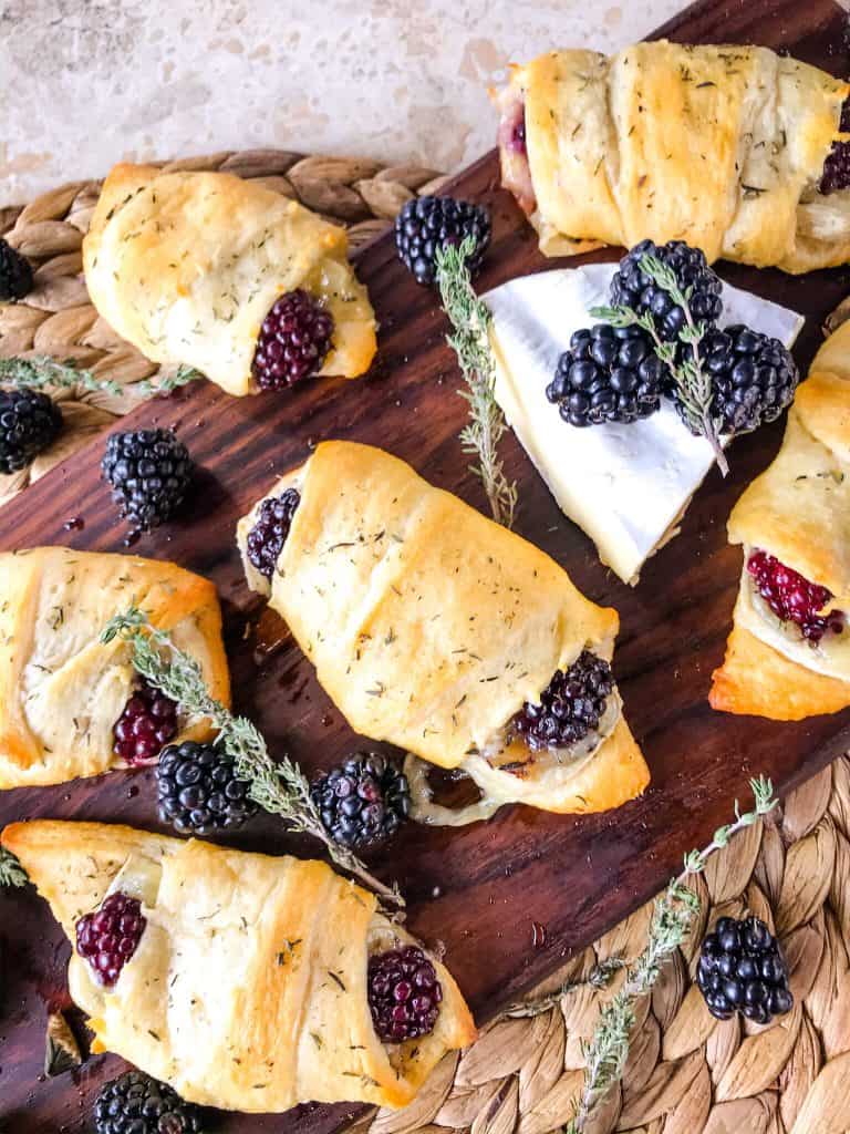 Blackberry Brie Crescent Rolls are a cheese crescent roll recipe filled with dried thyme, blackberries, and brie cheese. Add jam! Fast and easy sweet bread recipe. #crescentrolls #cheesycrescentrolls #blackberries