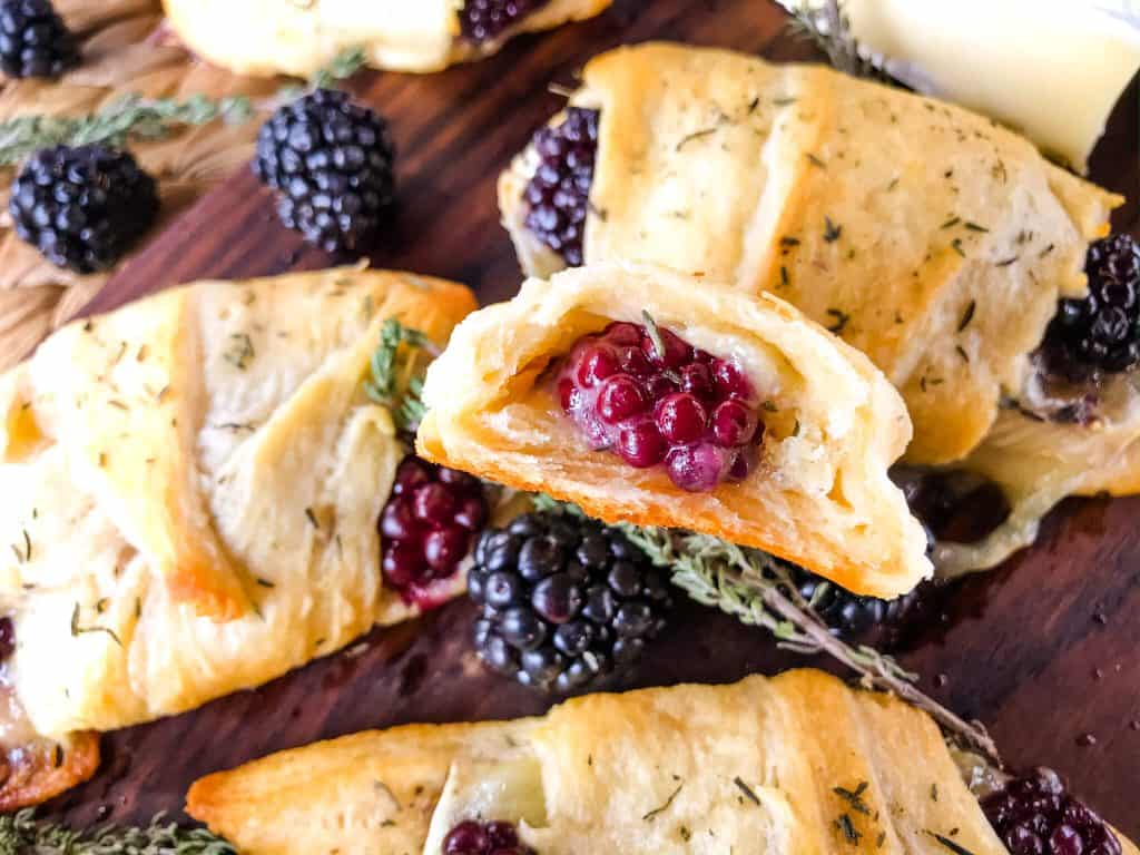 Blackberry Brie Crescent Rolls are a cheese crescent roll recipe filled with dried thyme, blackberries, and brie cheese. Add jam! Fast and easy sweet bread recipe. #crescentrolls #cheesycrescentrolls #blackberries