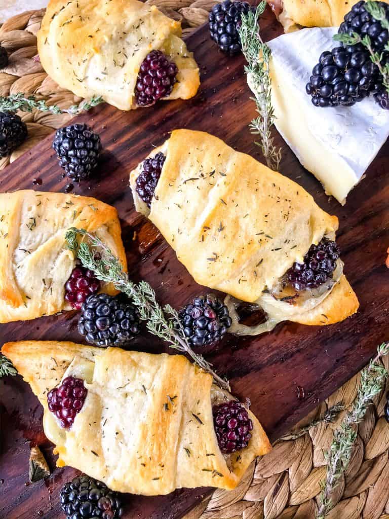 Blackberry Brie Crescent Rolls are a cheese crescent roll recipe filled with dried thyme, blackberries, and brie cheese. Add jam! Fast and easy sweet bread recipe. #crescentrolls #cheesycrescentrolls #blackberries