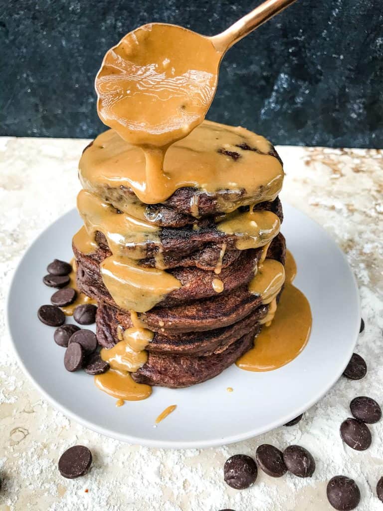 Mocha Pancakes with Coffee Glaze is an easy homemade pancakes recipe filled with cocoa powder, coffee, and chocolate. A fun dessert breakfast or brunch. #homemadepancakes #chocolatepancakes #sweetpancakes