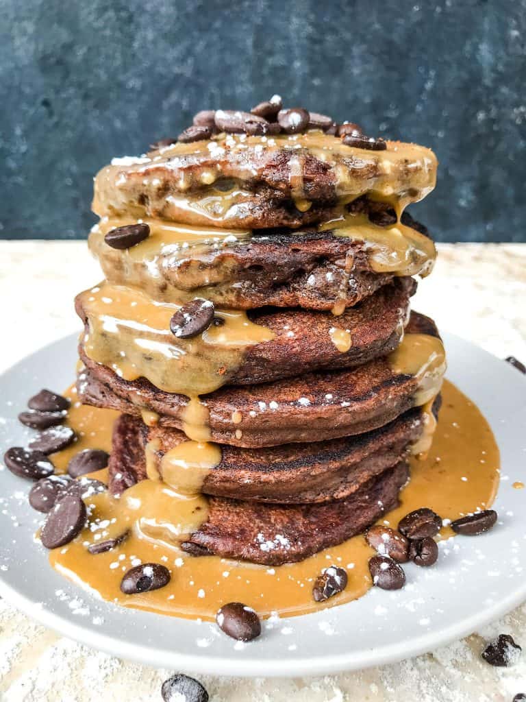 Mocha Pancakes with Coffee Glaze is an easy homemade pancakes recipe filled with cocoa powder, coffee, and chocolate. A fun dessert breakfast or brunch. #homemadepancakes #chocolatepancakes #sweetpancakes