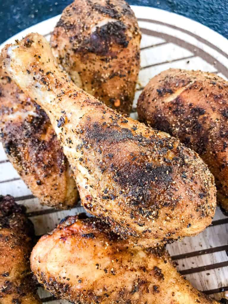 A close up of a grilled Three Pepper Dry Rub for Chicken Drumstick
