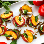 Nectarine Tomato Caprese Salad (Peach Caprese Salad) on a white place with title at top