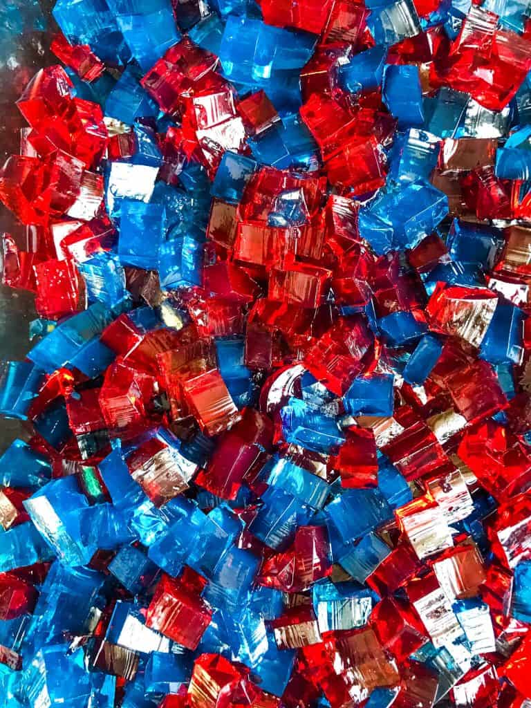 Red and blue jello cubes mixed together