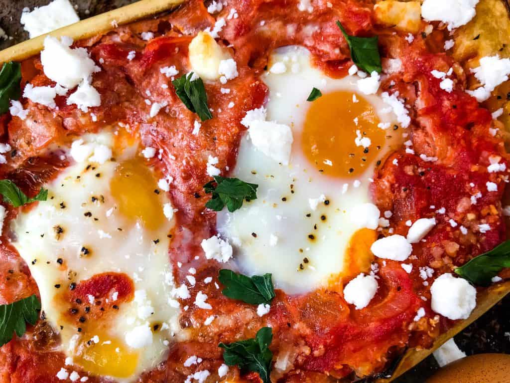 Close up of a half of Shakshuka Spaghetti Squash