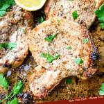 Pin of Italian Baked Pork Chops on a baking sheet with parsley and lemon. Title at bottom.