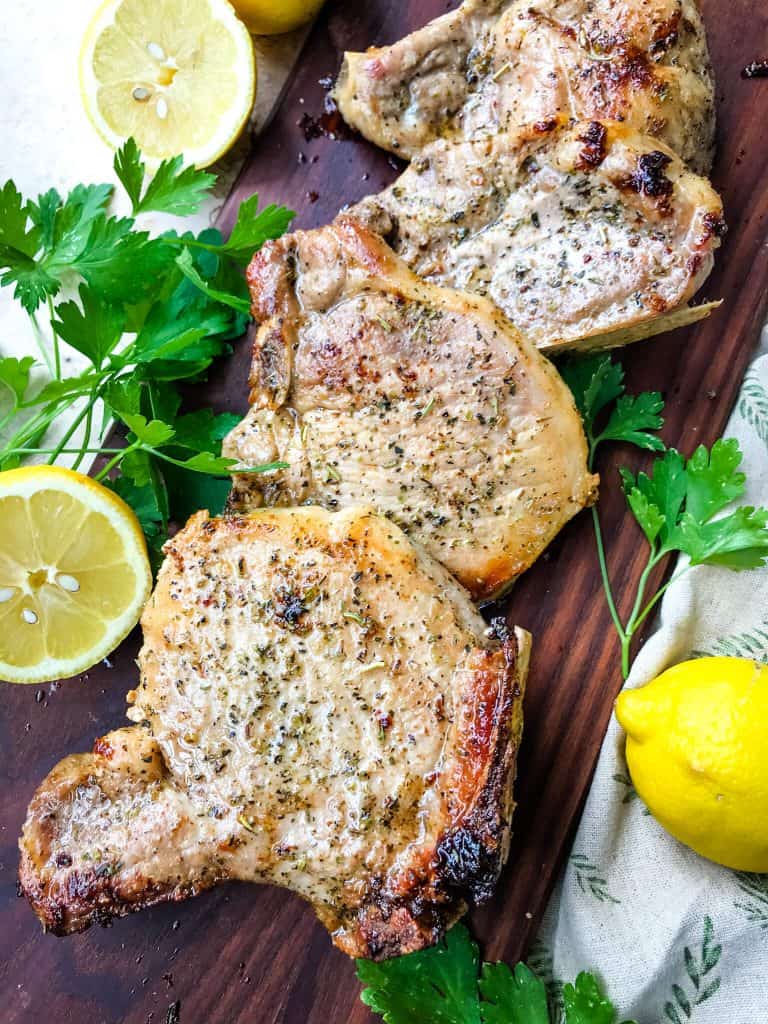 Pork chops on a cutting board