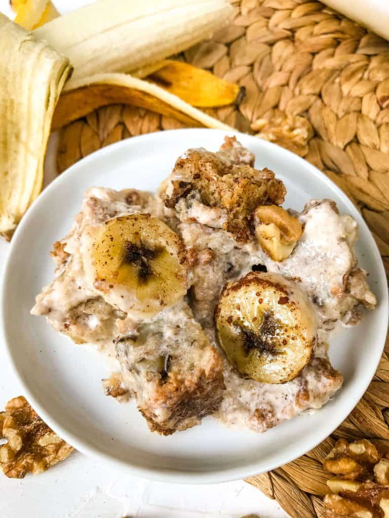 A small plate with Banana Bread Pudding on it