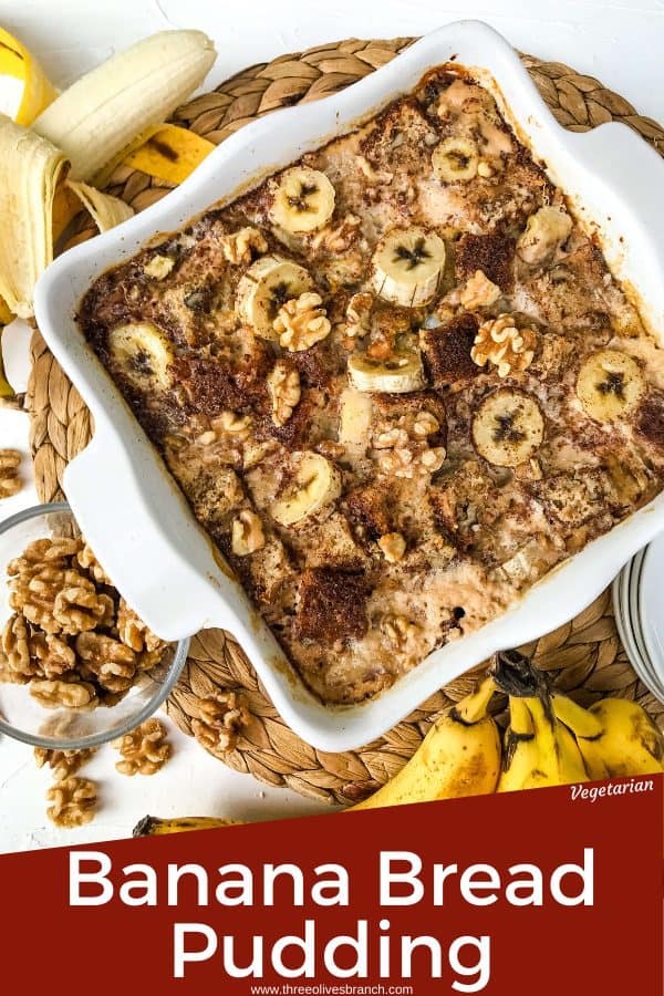 Pin image of Banana Bread Pudding in a square white dish with bananas around it and title at bottom