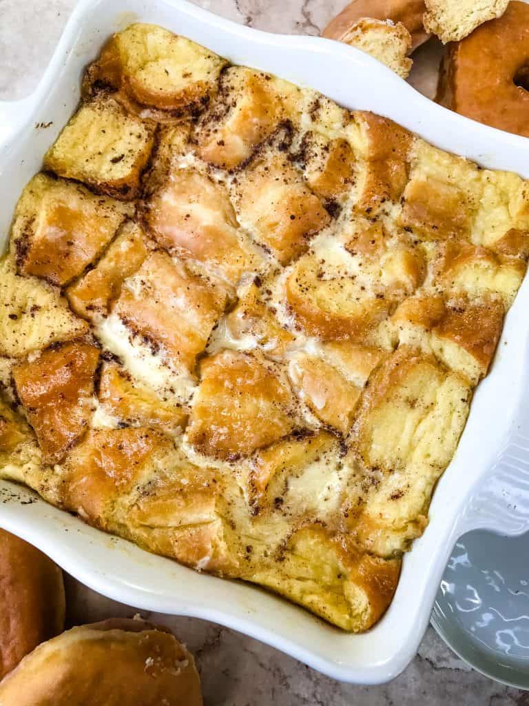 White dish filled with Doughnut Bread Pudding