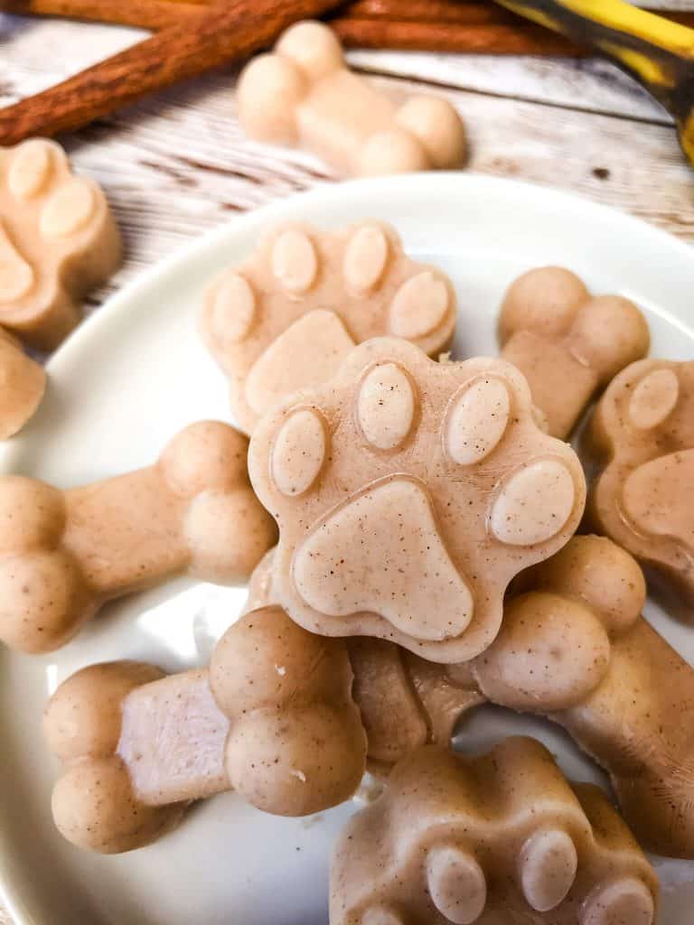 Close up of paw shaped Frozen Cinnamon Banana Dog Treat