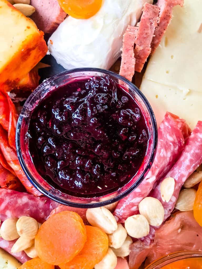 Homemade Cherry Jam Recipe in a bowl on a charcuterie platter