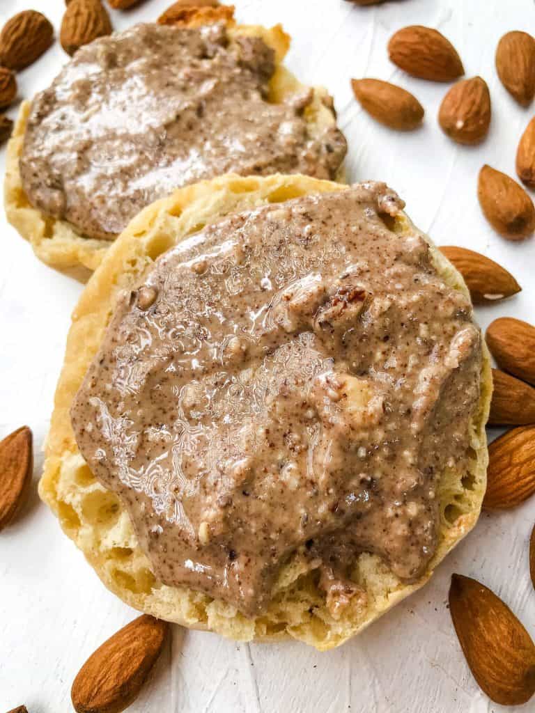 Homemade Crunchy Almond Butter Recipe spread on English muffins