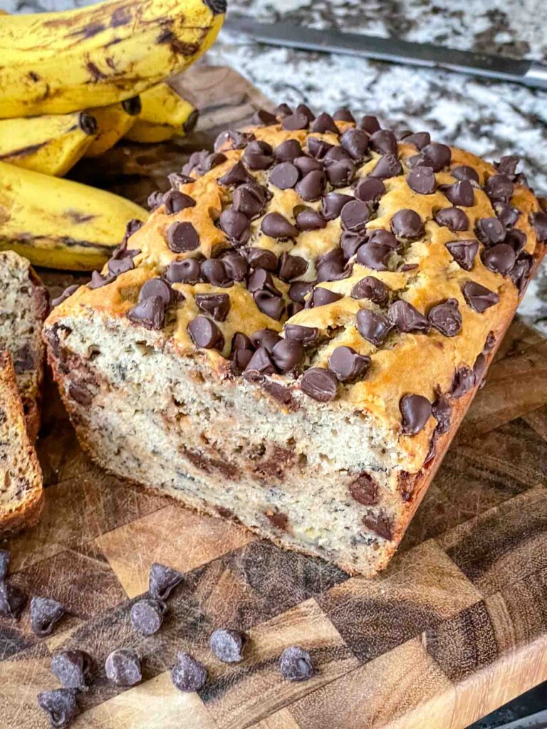 A Chocolate Chip Banana Bread loaf cut in half