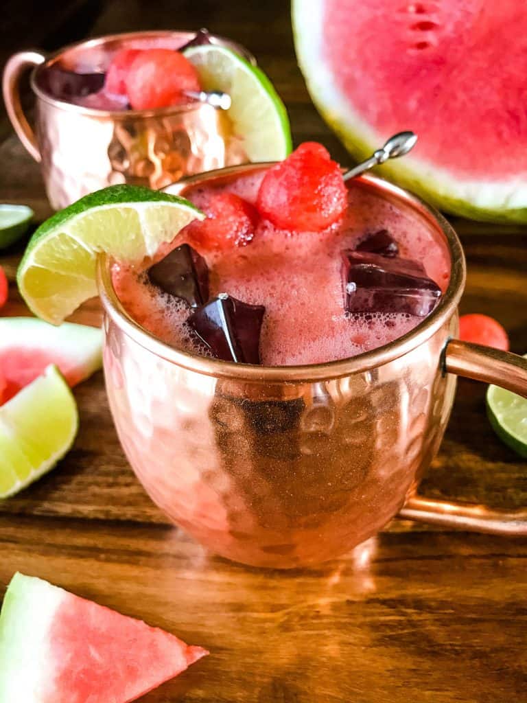A copper mug filled with Watermelon Moscow Mule