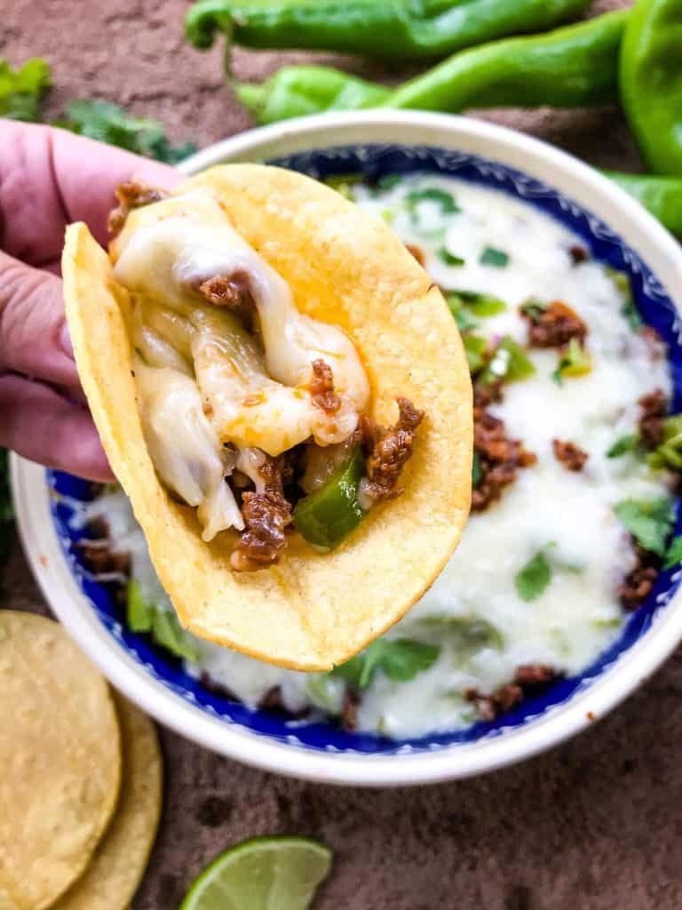 Hatch Green Chile Chorizo Queso Fundido in a tortilla