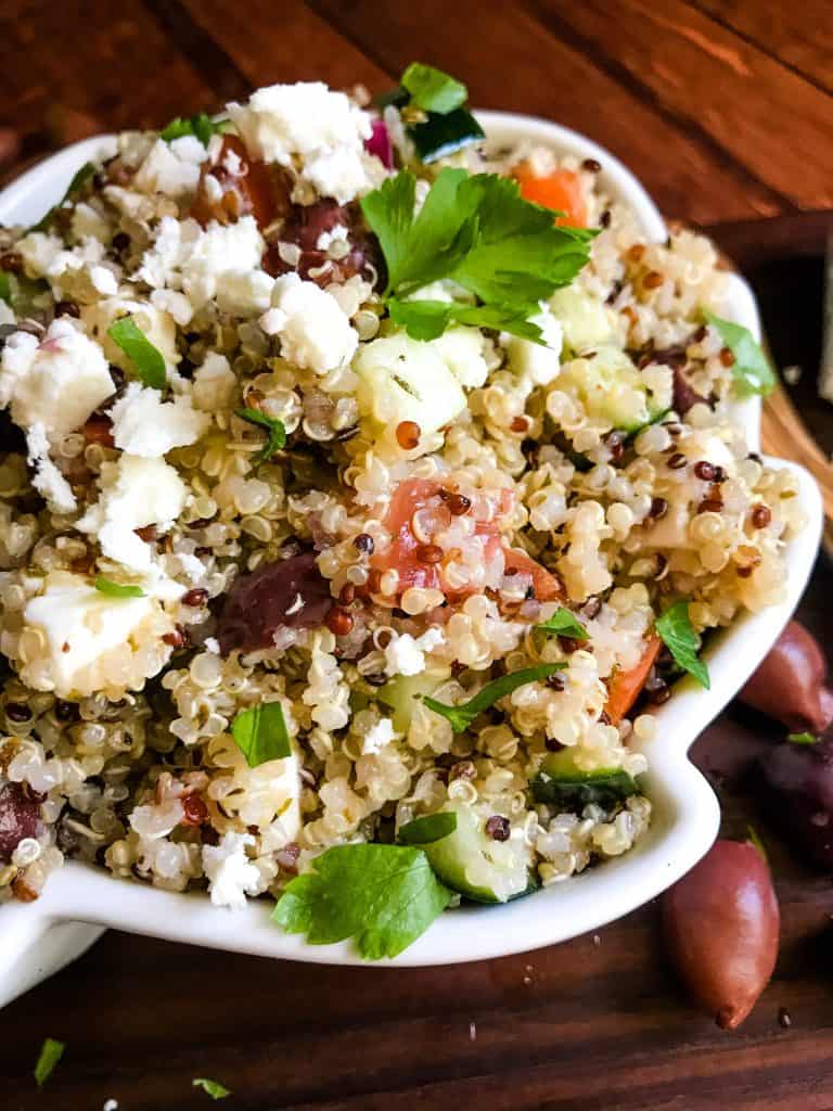 A close up of Greek Quinoa Salad in a bowl