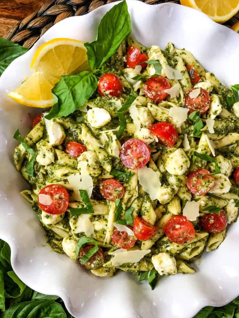 Closer look at Pesto Caprese Penne Pasta in a white dish