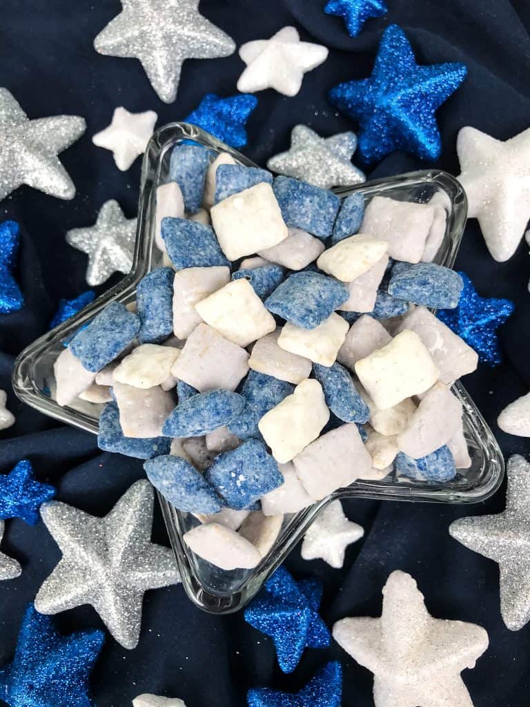 Dallas Cowboys Puppy Chow in a star dish surrounded by glitter stars