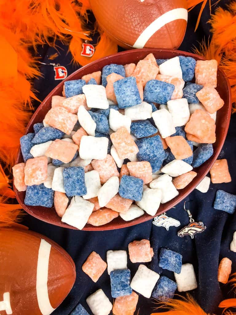 A bowl filled with Denver Broncos Puppy Chow