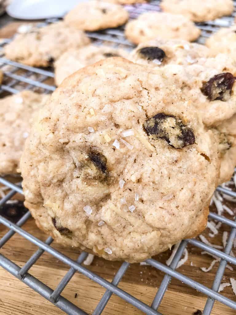 A close up of a Chewy Coconut Oatmeal Raisin Cookies with Walnuts