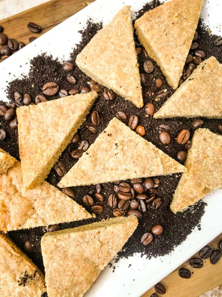 A plate of cookies on top of coffee grounds