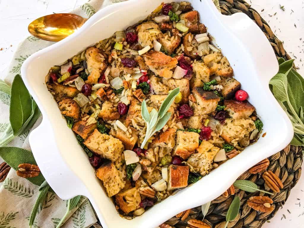 Top view of the dressing in a white square dish