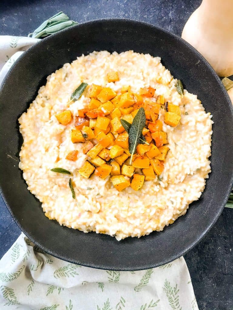 A black bowl filled with Butternut Squash Sage Risotto