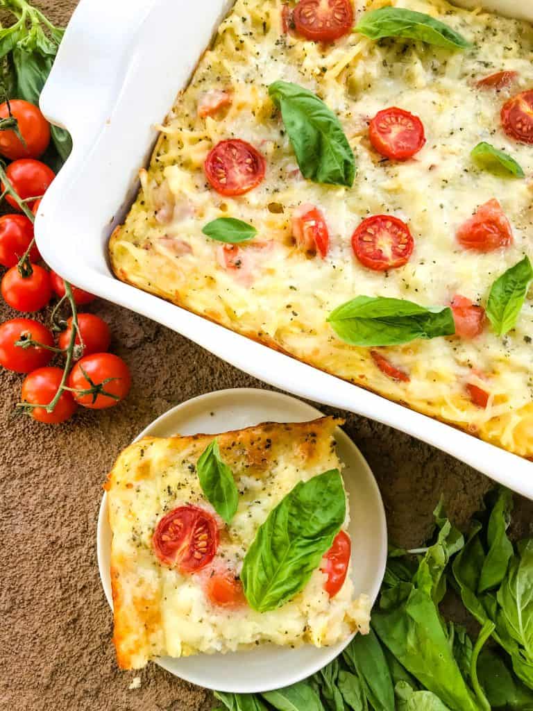 Caprese Hashbrown Breakfast Casserole and a piece on a palte