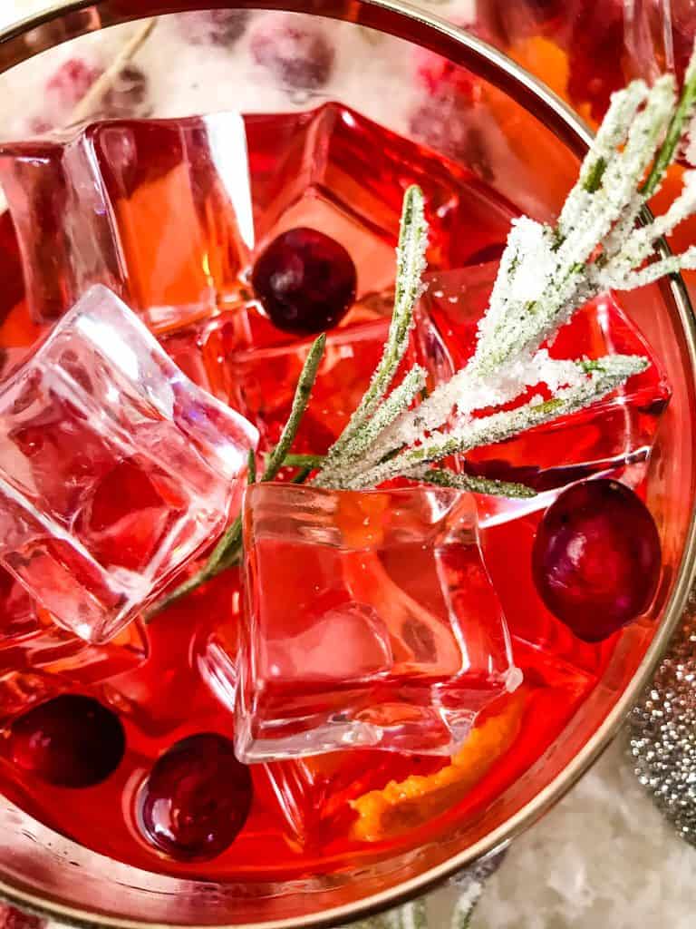Close up of Cranberry Old Fashioned Cocktail from top